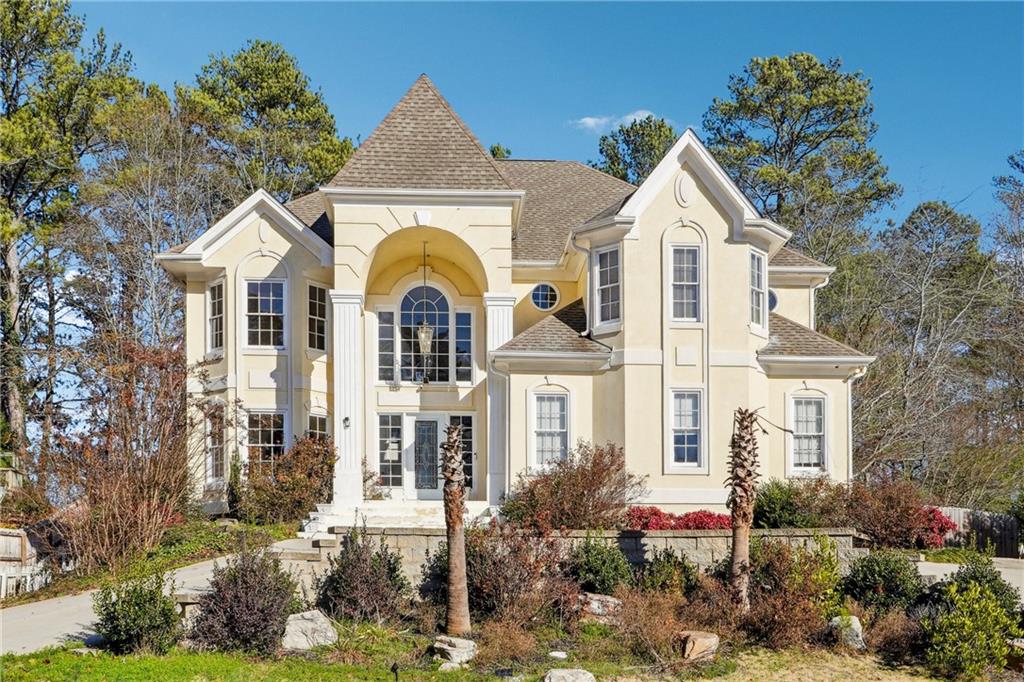 CALLING ALL INVESTORS-Elegant Home in Prestigious Community with Endless Potential–Sold As-Is-CASH ONLY
Discover this one-of-a-kind home in a highly desirable neighborhood, offering elegance, functionality, and convenience. With 4,000 sq ft of living space, this 6-bedroom, 3 1/2-bathroom property is perfect for multi-generational living or those who love to entertain. While the home radiates charm, it does require TLC and is being sold "as-is," presenting a fantastic opportunity to customize it to your liking. Real hardwood floors throughout and custom crown molding add timeless elegance. The open family room features a stunning marble fireplace and a view into the kitchen, complete with stainless steel appliances, granite countertops, and an L-shaped island perfect for casual dining. The spacious master suite has a massive walk-in closet and generously sized secondary bedrooms provide comfort and functionality. The FINISHED BASEMENT is Ideal for multi-generational living or rental potential, the basement includes a fully equipped IN-LAW SUITE with its own kitchen, granite countertops, living room, studio, and a private exterior entrance for added privacy. Relax and entertain in the private, fenced backyard featuring an oversized deck, an in-ground pool, and plenty of space to enjoy quiet evenings or host gatherings. Take advantage of community amenities, including a pool and tennis courts. The home is conveniently located near Collins Hill Golf Club, Georgia Gwinnett College, Mall of Georgia, Collins Hill Park, local libraries, and a variety of restaurants. Additionally, it’s situated in the sought-after Collins Hill High School district. Opportunity Awaits - This home’s elegant features and prime location offer incredible potential, but it is in need of some updates and is being sold "as-is." Whether you’re looking for a family home or a renovation project, this property is your chance to create something truly special. Make this house your dream home.