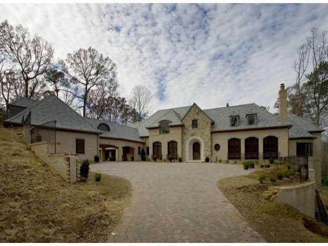 Experience the ultimate in privacy in the heart of the city. Another Renaissance Dev. masterpiece by Bill Harrison - Completion 4th quarter 2007 - Beautiful walk-out main level pool is located off covered porch with fireplace. Master on main w/his & her baths - 12 ft ceilings - Incredible home!!!