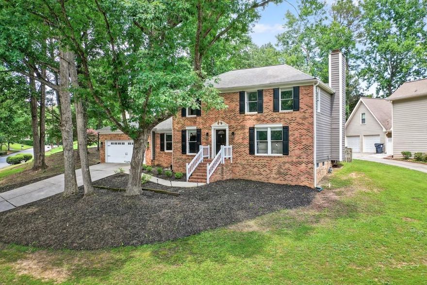 Incredible Value in Walton District – Finished Basement, Home Office & Upgrades!
Don’t miss this rare opportunity to own a move-in ready home in one of East Cobb’s close in neighborhoods—Villa Chase, zoned for top-rated Walton High School. Offering space, style, and smart updates, this home checks every box.
The renovated kitchen features on-trend grey cabinetry with gold hardware, granite countertops, stainless steel appliances, and a breakfast area—all open to a cozy fireside family room. A formal dining room, separate living room, private home office, and spacious laundry room add to the home's functionality and appeal.
Upstairs, the light-filled primary suite includes a spa-like bath with soaking tub, double vanities, and walk-in closet. Three secondary bedrooms share a full hall bath. The finished basement is a standout bonus—ideal for a media room, gym, or playroom, plus ample storage space.
Enjoy a level, fenced backyard with a freshly stained deck—perfect for outdoor entertaining. Recent upgrades include new main-level flooring, updated lighting,  new carpet in basement, new roof, new HVAC second floor, new water heater, all new door and cabinet hardware. Priced competitively with features typically found in much higher-end homes—this home offers exceptional value in the heart of East Cobb.