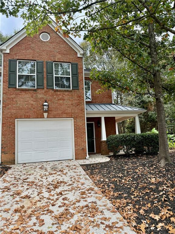 Beautiful spacious 3 Bedroom, 2.5 bathroom, 3 side brick End Unit Townhome. New carpet and tile floors, updated bathrooms, brand-new stainless-steel appliances, white cabinets, electric range/oven, dining overlooking living room, wide hallways, and fireplace in the living room. Tray ceiling in Master Bedroom, Master Garden tub with double vanity with double closets, Spacious secondary bathroom, walk in closets, great front porch and private patio off the living room. Washer and Dryer included! Home has a one car garage. Huge Corner Lot. Home is in move-in condition. Great location, close to Ronald Reagan Parkway & Lawrenceville Hwy. ***Landlord accepts Housing Choice Vouchers***. Call today!