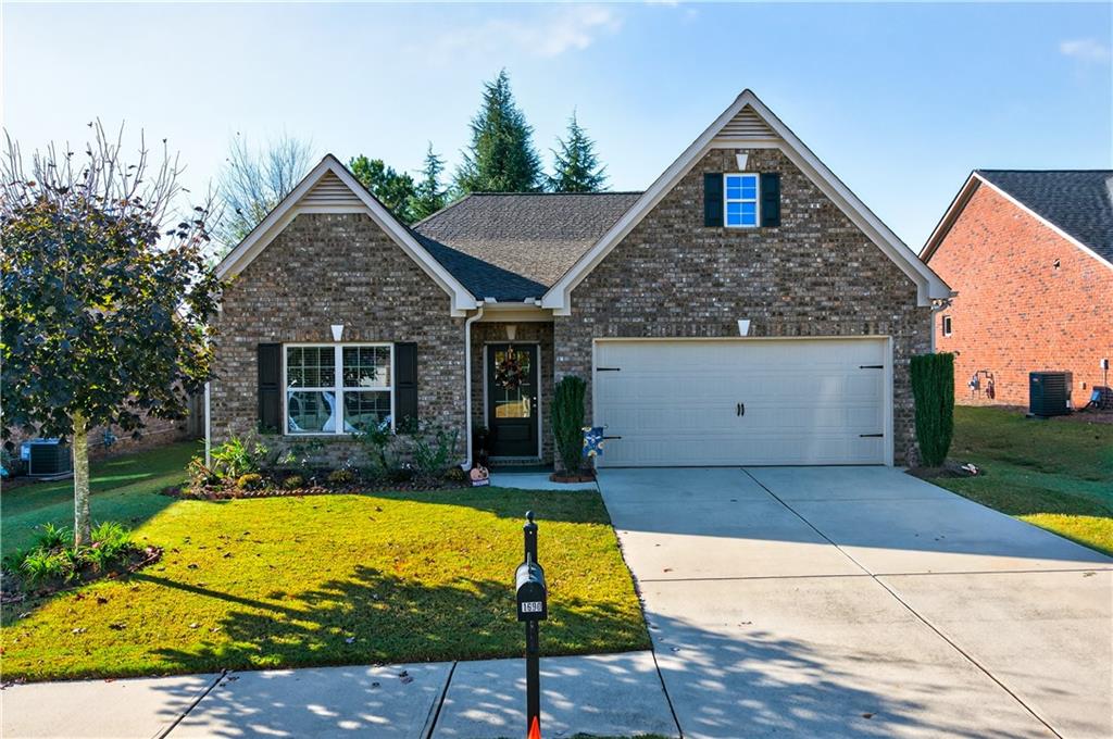 Welcome to this beautifully maintained 3-bedroom, 2-bath home located just minutes from the Cumming City Center and other local amenities. Featuring an inviting open-concept living area, this home offers the perfect blend of comfort and functionality—ideal for entertaining family and friends.
The spacious kitchen boasts granite countertops, ample storage, and a large walk-in pantry, making meal prep a joy. Relax in the light-filled living room or step outside to the back patio with a retractable awning, where you can enjoy your morning coffee or evening gatherings in any weather.
The fenced backyard is a private retreat, highlighted by lush gardens that create a peaceful, picturesque setting. With thoughtful details throughout and a convenient location close to shopping, dining, and recreation, this home truly has it all.
