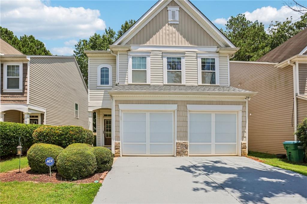 Charming Two-Story Home in Prominence Court – The Perfect Blend of Comfort, Style & Location! Welcome to this beautifully maintained and truly move-in ready home in the highly desirable Prominence Court community of Canton! With a picturesque, park-like backyard, this residence offers the ideal mix of modern updates, functional spaces, and inviting charm. Step inside to discover bright, open living areas featuring durable and stylish **laminate wood flooring throughout—**that’s right, no carpet anywhere! The formal dining room impresses with elegant columns and classic chair rail details, setting the stage for memorable gatherings. The light-filled living room is centered around a cozy fireplace and flows seamlessly into the updated kitchen, complete with granite countertops, a breakfast bar, tile backsplash, and a sunny breakfast room overlooking the private, fenced backyard. Upstairs, a spacious loft provides incredible versatility—think home office, media room, playroom, or gym. The oversized primary suite features a vaulted ceiling and en-suite bath with dual vanities, a soaking tub, separate glass-enclosed shower, and vanity seating for added comfort. Two additional bedrooms, a full hall bath, and an upstairs laundry room complete the second level for everyday convenience. Step outside to your own backyard oasis—a covered patio with a charming pergola, extended entertaining area, and plenty of space for outdoor dining, grilling, or simply relaxing under the Georgia sky. Tech-savvy buyers will love the smart home upgrades, including smart thermostats, a video doorbell, and a vehicle charging station. The community features a swimming pool, playground, and walking trails, just steps from your front door. Located minutes from downtown Canton and Woodstock, with easy access to I-575, shopping, parks, dining, and entertainment options—this home truly offers the lifestyle you’ve been searching for. Don’t wait—schedule your private showing today and make this incredible home yours before it’s gone!