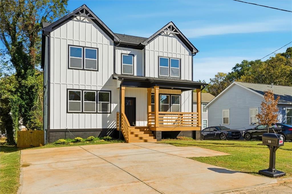 Let your home help fund your life with this NEW CONSTRUCTION: live upstairs, let downstairs pay—the private-entry 1BR basement suite, ideal for a tenant, in-law, or long-stay guest, can earn about $1,250/month to offset your payment or boost cash flow. Sweeten the deal with $5,000 toward closing costs when you use our preferred lender. Welcome to 54 Brown Ave SE, a newly built contemporary-farmhouse in an intown Atlanta location near the BeltLine and MARTA. With ~3,500 sq ft across three levels, the home’s flexible layout is designed for real life: a primary suite on the main (double vanity, separate tub/shower, soaking tub), an open kitchen with stone counters, an island, pantry, and a view to the family room, and multiple bonus spaces—including a sun room, office, and den—all under 10' ceilings on the main and 9' up for an airy feel. Cozy up by the fireplace, then step outside to enjoy a front porch, covered areas, deck, and patio overlooking a private, fenced backyard that’s landscaped and level.
Upstairs you’ll find three bedrooms and two full baths, plus convenient laundry on the upper floor. Downstairs, the full, finished daylight basement (with driveway access and its own exterior entry) features the separate 1-bed/1-bath apartment and an additional laundry room—ideal for generating income, hosting, or creating a private workspace. Parking is easy with a wide driveway (3+ spaces) and an EV charging station on the side of the house. There’s no HOA or rental restrictions noted, and a home warranty is included for extra peace of mind.
Quality details continue with cement-siding construction over block/slab foundation, insulated windows, central heat-pump HVAC, and durable vinyl/other flooring in high-use areas. You’re minutes to downtown, public transportation, and neighborhood amenities—making this a smart buy for both lifestyle and long-term value.