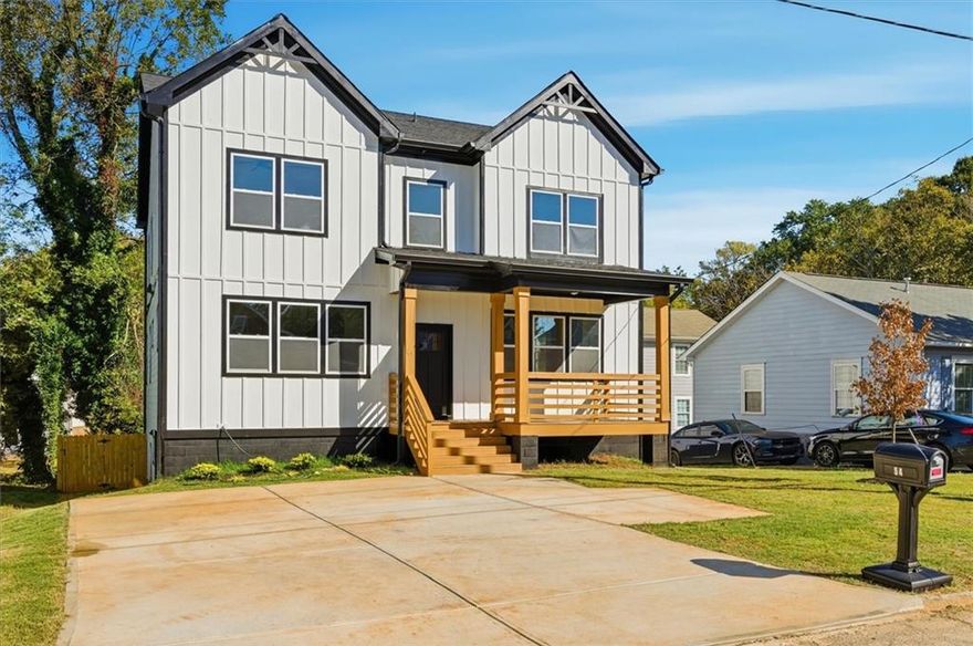 Let your home help fund your life with this NEW CONSTRUCTION: live upstairs, let downstairs pay—the private-entry 1BR basement suite, ideal for a tenant, in-law, or long-stay guest, can earn about $1,250/month to offset your payment or boost cash flow. Sweeten the deal with $5,000 toward closing costs when you use our preferred lender. Welcome to 54 Brown Ave SE, a newly built contemporary-farmhouse in an intown Atlanta location near the BeltLine and MARTA. With ~3,500 sq ft across three levels, the home’s flexible layout is designed for real life: a primary suite on the main (double vanity, separate tub/shower, soaking tub), an open kitchen with stone counters, an island, pantry, and a view to the family room, and multiple bonus spaces—including a sun room, office, and den—all under 10' ceilings on the main and 9' up for an airy feel. Cozy up by the fireplace, then step outside to enjoy a front porch, covered areas, deck, and patio overlooking a private, fenced backyard that’s landscaped and level.
Upstairs you’ll find three bedrooms and two full baths, plus convenient laundry on the upper floor. Downstairs, the full, finished daylight basement (with driveway access and its own exterior entry) features the separate 1-bed/1-bath apartment and an additional laundry room—ideal for generating income, hosting, or creating a private workspace. Parking is easy with a wide driveway (3+ spaces) and an EV charging station on the side of the house. There’s no HOA or rental restrictions noted, and a home warranty is included for extra peace of mind.
Quality details continue with cement-siding construction over block/slab foundation, insulated windows, central heat-pump HVAC, and durable vinyl/other flooring in high-use areas. You’re minutes to downtown, public transportation, and neighborhood amenities—making this a smart buy for both lifestyle and long-term value.