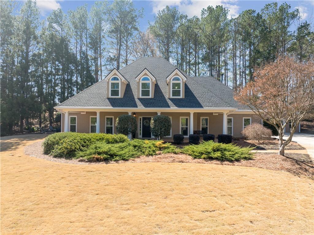 Welcome to 2407 Honey Ct, an updated 4-bedroom, 3.5-bathroom home located in the prestigious Lake Dow North community in McDonough, Georgia. This home offers a perfect blend of luxury, comfort, and modern amenities, making it an ideal haven for discerning homeowners. As you walk in, you'll see the formal dining room and study. The heart of the home-the kitchen-has been meticulously renovated to include top-of-the-line appliances and sleek countertops, making it a chef's dream. The main-level primary suite ensures privacy and convenience, featuring hardwood floors and an updated en-suite bathroom, complete with oversized closet space. All bathrooms have been tastefully updated. Upstairs are three additional bedrooms, each are oversized, offering comfort and extra storage, perfect for kids, extended family and guests. There's also a fire pit and wiring for an optional hot tub. Enjoy mornings or evenings on the patio, overlooking the 8th hole of the Georgia National Golf Club. For those with a penchant for DIY projects or professional craftsmanship, this home includes a dedicated workshop outfitted with two 220V electrical outlets-a rare and valuable feature for hobbyists and entrepreneurs alike. Beyond the home, Lake Dow North offers a lifestyle rich in amenities. Residents enjoy private access to Lake Dow, perfect for boating, fishing, and relaxing by the water. The Georgia National Golf Club, located within the community, is a championship-caliber private course offering a challenging yet scenic experience for golf enthusiasts. Additionally, optional membership opportunities at the Lake Dow Club provide access to a pool, fitness center, and tennis courts.