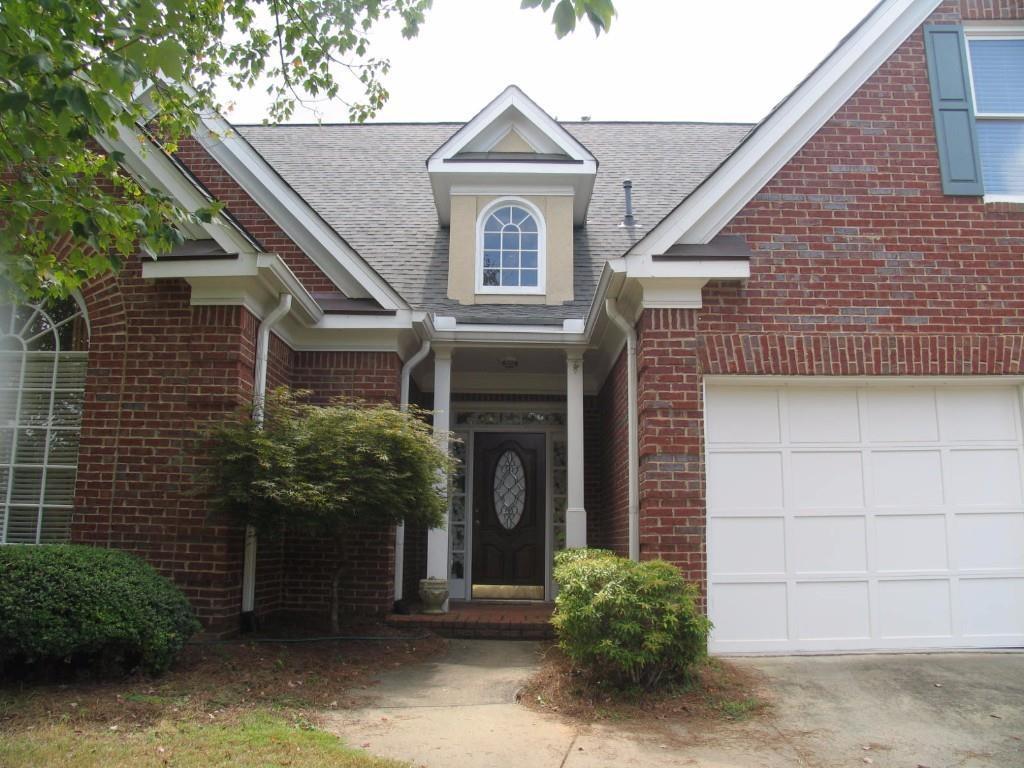 Amazing location with best trifecta of schools: Sope Creek Elem/Dickerson Middle/Walton High. Kids can walk to Dickerson Middle School. This brick home has a wonderful arrangement of master suite and one of 4 secondary bedrooms on the main for parents in master suite and the youngest child or grandparent in extra bedroom. The rest of the 3 secondary bedrooms are upstairs sharing an open loft overlooking the great room. The large kitchen with white cabinetry and a sunny breakfast room plus bar, adjoins the formal dining room fitting up to 12 guests. The fabulous great room opens to a flat grassy backyard through a set of French doors. The backyard is private and fenced in for young kids and dogs. Te master bath has been totally gutted and rebuilt into a serene spa. You'll love it from the moment you enter the grand two story foyer! This is a true entertainer's cozy abode.