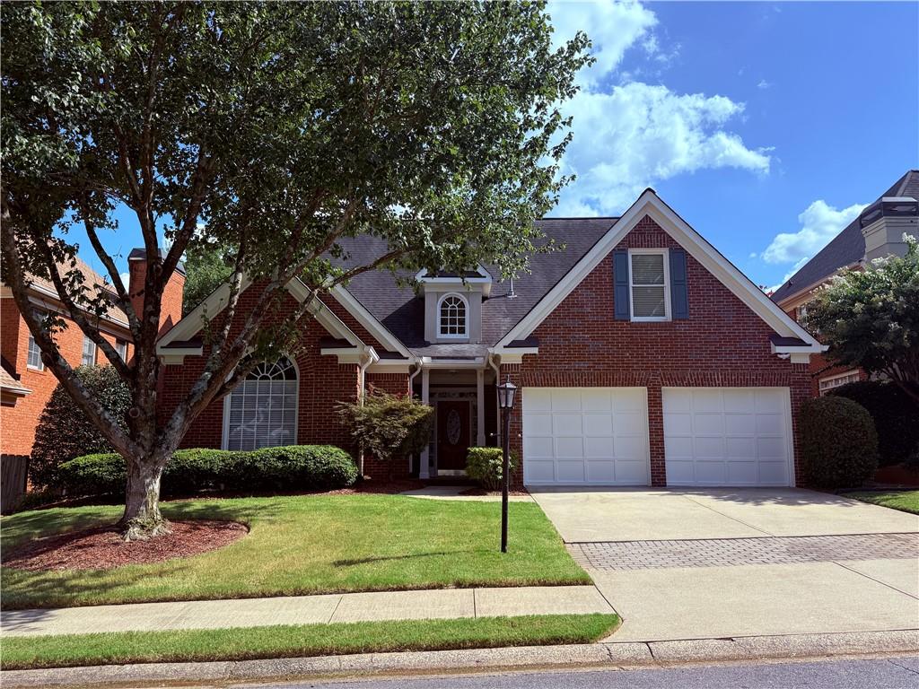 Amazing location with best trifecta of schools: Sope Creek Elem/Dickerson Middle/Walton High. Kids can walk to Dickerson Middle School. This brick home has a wonderful arrangement of master suite and one of 4 secondary bedrooms on the main for parents in master suite and the youngest child or grandparent in extra bedroom. The rest of the 3 secondary bedrooms are upstairs sharing an open loft overlooking the great room. The large kitchen with white cabinetry and a sunny breakfast room plus bar, adjoins the formal dining room fitting up to 12 guests. The fabulous great room opens to a flat grassy backyard through a set of French doors. The backyard is private and fenced in for young kids and dogs. Te master bath has been totally gutted and rebuilt into a serene spa. You'll love it from the moment you enter the grand two story foyer! This is a true entertainer's cozy abode.