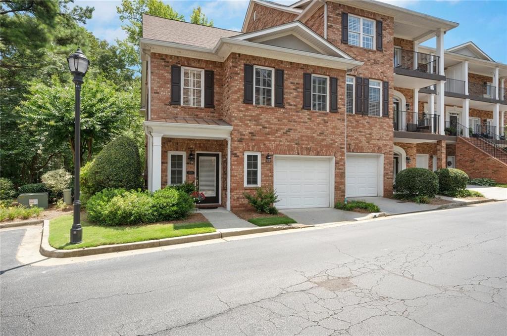 Gorgeous end unit, 3 level townhome, in the heart of Brookhaven. Walk to shops, restaurants, cafes, and public transportation. Splendid layout with a great entry hall for greeting guests. The kitchen is open to the living room and dining room. Plus French doors off of the living room lead to the charming rear patio that overlooks a nice parklike setting. The second floor features 3 bedrooms including the large master suite with spacious master bath and large walk-in closet, and laundry closet on the second floor. From the master bedroom go up another level to the bonus bedroom/office/fitness space. Plus large walk in storage off of the third level. The neighborhood gates close in the evenings.