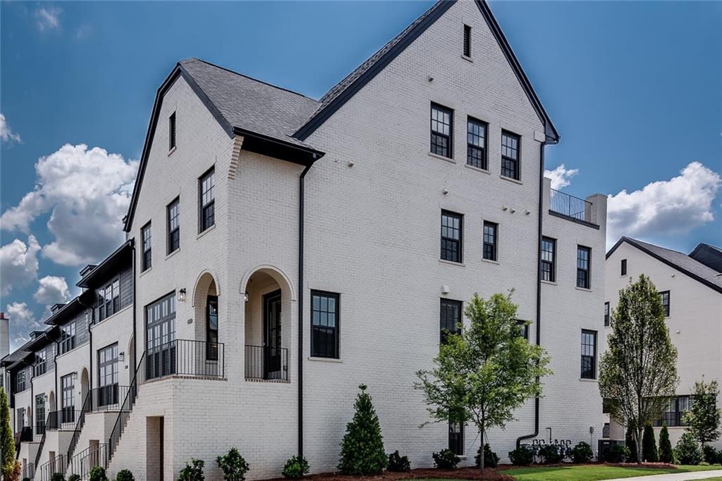 RARE OPPORTUNITY – Luxurious End-Unit Townhome in Gated Serenade! Welcome to this stunning townhome in the prestigious, gated Serenade community, just 5 minutes from Avalon and Downtown Alpharetta! With abundant natural light and unobstructed views of a serene 6-acre park, this home offers both privacy and elegance in a prime location. Inside you'll find a spacious, open-concept floor plan with designer finishes throughout | Gourmet kitchen featuring quartz countertops | Stainless steel appliances, ample cabinetry, and a massive center island — perfect for entertaining | Fireside family room opens to an oversized deck with peaceful park views | Finished terrace level includes a den, bedroom, full bath, and extra storage.
Luxury Living Features: Third-level primary suite with spa-like bath | Frameless glass shower | Freestanding soaking tub, dual vanities, and large walk-in closet | Additional secondary en suite bedroom on the third floor | Elevator shaft/closet on each floor.
Fourth-floor flex/bedroom with full bath and sky deck overlooking the park. Hardwood floors and luxury plank flooring throughout the home. Top-level sky deck and bonus room provide incredible flexibility — ideal for a home office, guest suite, or media room.
Enjoy the sounds of live music from nearby Ameris Bank Amphitheatre and take advantage of the community's resort-style amenities: Swimming pool, cabana with fireplace, and private park access with walking trails. Plus Alpha Loop trail access for biking or walking to Avalon, Big Creek Greenway, North Point, and Alpharetta City Center.
Location, Lifestyle, and Convenience! Just 5 minutes from Avalon & Downtown Alpharetta, restaurants, boutiques, farmer’s market, festivals, Brooke Street Park, live music and more! Top-rated schools, entertainment, and major commuting routes. Don’t miss your chance to own this exceptional home in one of Alpharetta’s most desirable communities! Photos coming August 9.