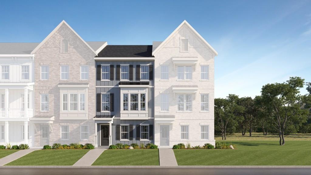 Welcome to Forrest Crossing! This new three-story townhome with a two-car garage features a smart layout that provides ample room to grow and entertain. Upon entry into the home is a versatile bedroom suite to accommodate independent living, while upstairs is the main living area. It showcases a well-equipped kitchen, dining room and a welcoming Great Room, which is elevated by a center fireplace and rear deck. Residing on the top floor are two secondary bedrooms and a tranquil owner's suite. Prices, dimensions and features may vary and are subject to change. Photos are for illustrative purposes only.