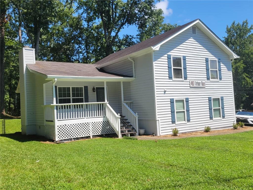 Lawrenceville-Suwanee Rd Residential house PLUS 506 sqft of commercial space. This unique home is a great opportunity for the person in need of commercial space. Home is nicely updated with hardwood floors and tile. Large master bedroom and bath with double vanity. Large living space overlooking the kitchen area. Kitchen has eat in space and leads to an enclosed patio overlooking a private backyard. Commercial space has plumbing available for saloon/other uses. Or just an office. Half bath is attached to the space. Great visibility and location!