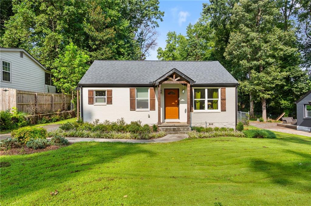 Welcome to your charming Decatur bungalow—fully renovated from the studs out and designed with today’s lifestyle in mind. Perfectly located near downtown Decatur, East Lake Golf Club, I-285 & I-20, this home is the total package: character, convenience, and craftsmanship.
Inside, you’ll find a bright, open layout with new hardwood floors, designer touches, and abundant natural light. The kitchen shines with antique white cabinetry, stainless steel appliances, quartz countertops, and a marble-inspired backsplash—a clean, timeless look for cooking and entertaining.
This smart floor plan was reimagined from a 2/1 to a true 2/2, giving you a spacious owner’s suite with vaulted ceilings, spa-like shower, and dedicated laundry space. Every system has been updated, including the roof, HVAC, water heater, and windows, so you can enjoy peace of mind for years to come.
Step outside to a large, fenced backyard with plenty of space to play, garden, or host friends. A roomy outdoor shed offers bonus storage or potential workshop vibes.
With its classic all-brick exterior, fresh landscaping, and a driveway that makes parking a breeze, this home checks every box.