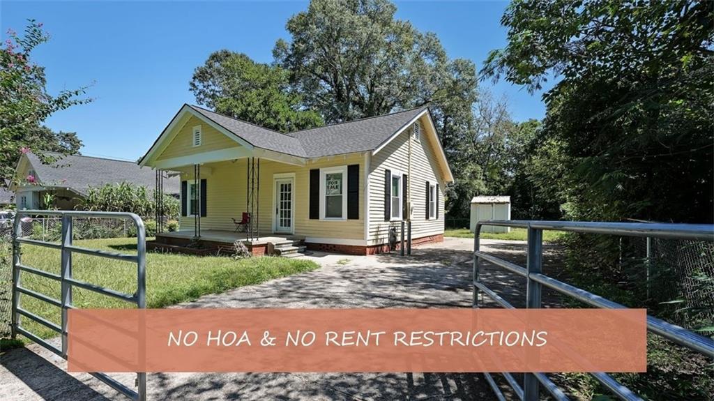 || NEW ROOF || || FENCED, LEVEL LOT ON A QUIET STREET || || RANCH HOME – SINGLE LEVEL LIVING || || NEW LVP FLOORS IN MAIN LIVING AREAS || || NO HOA & NO RENT RESTRICTIONS ||
** What You’ll See **
Step onto the COVERED FRONT PORCH and picture yourself watching the world slow down from a quiet, tree-lined street. Inside, notice the BRAND-NEW LVP FLOORS that bring a fresh, modern look, paired with touches of REAL HARDWOODS for warmth and character. The DECORATIVE FIREPLACE makes a charming focal point, while the wide FENCED BACKYARD with STORAGE BUILDING offers room to spread out and organize.
** What You’ll Hear **
You’ll enjoy the QUIET PEACE OF A PRIVATE STREET, away from busy traffic. Picture evenings where the only sounds are crickets outside or kids playing in the backyard. Inside, imagine the gentle creak of a rocking chair out on the porch or the soft hum of your own music filling the space without competing with outside noise.
** What You’ll Feel **
Appreciate the ease of SINGLE-LEVEL LIVING with a LEVEL DRIVEWAY, making every day more convenient. Feel the sense of freedom with NO HOA telling you what you can or cannot do, and the flexibility of NO RENT RESTRICTIONS, perfect for investors or homeowners wanting control. Comfort, privacy, and low-maintenance living come together here.
** What You’ll Experience **
This home offers a lifestyle that’s both SERENE AND PRACTICAL. Enjoy morning coffee on the porch, family gatherings in the fenced yard, or the reassurance of a NEW ROOF already taken care of for you. Whether you’re looking for a starter home, downsizing, or investing, you’ll experience ownership with possibilities—and a place where life feels just a little simpler.