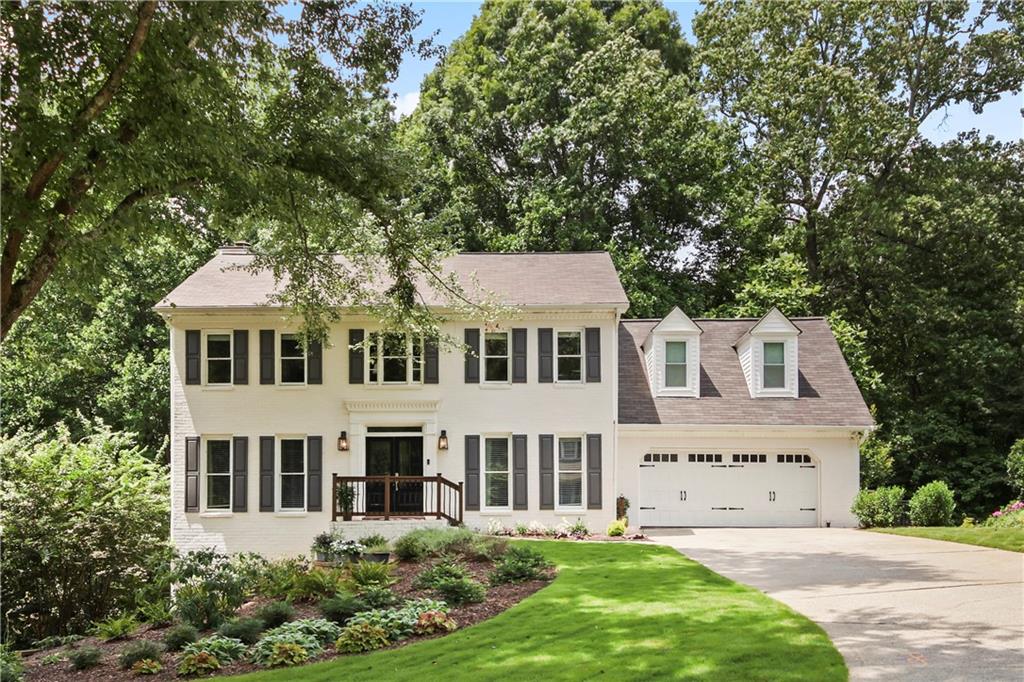 Welcome to this very special home in the coveted Westchester neighborhood, with a Roswell address and Cobb county taxes!!! Double front entry doors and a lovely entry foyer welcomes you. Newly painted brick exterior, beautifully renovated gorgeous kitchen with a charming sitting/keeping room, stainless steel appliances, breakfast area overlooking wooded backyard overlooking a serene creek, huge walk-in pantry, island and roll out shelving and deep drawers for tons of storage. Immaculate warm refinished hardwood floors throughout the main level, massive dining room that opens to the spacious family room which offers bright wall of windows overlooking beautiful creek and trees (feels like you're in a treehouse and the property goes to the other side of the creek), stunning stone fireplace with double floating shelving on either side. The family room as well as kitchen have glass doors that open out to a large entertaining deck. Upstairs offers a beautiful primary bedroom with incredibly large his and her closets with laundry inside one of them. Primary bathroom offers vaulted ceiling, double vanities, large soaking tub and separate shower. There are also 3 additional nicely sized secondary bedrooms and a full bathroom. Finished terrace level is a wonderful entertaining space and hang out area, 2nd family room area perfect for watching movies, football games, etc. also offers a home office, a full bathroom and a large unfinished area perfect for storage or could be finished. Terrace level opens out to the 2nd large deck connected to the upper deck with stairs. This home backs to the most serene wooded space and small creek and also backs to Mabry Park creating the perfect private retreat. It is so special and quiet. Sit and watch the deer and birds. Upgraded HVAC system installed in 2019, new water heater in 2022, newer front door assembly and garage door. Wonderful Cobb county schools, active community offers a clubhouse, a pool, swim team, four tennis courts, a basketball court and so much more. Minutes to Downtown Roswell, tons of great shopping, restaurants, parks, awesome schools and more.