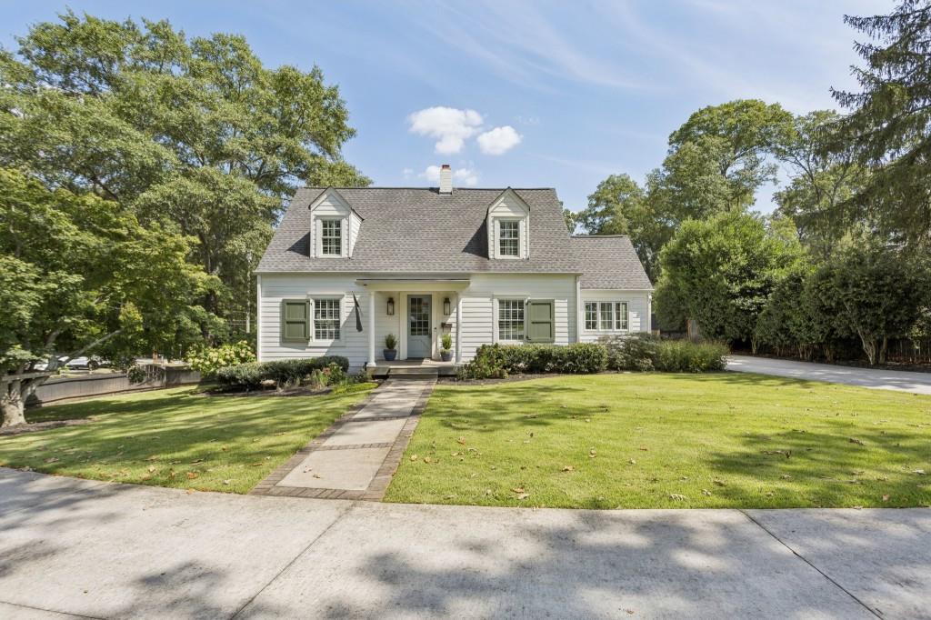 The Atherton House | Classic Charm Meets Modern Luxury in Historic Marietta! Just steps from Marietta Square, this Fully Renovated residence blends timeless Character with high-end finishes for today's lifestyle. Inside, walls of Natural Light highlight the Spacious Family Room anchored by a cozy Fireplace. The Chef's Kitchen will impress with a Custom Marble Backsplash, Top-of-the-Line Stainless Steel Appliances including a 36" Gas Range, and a Large Island Breakfast Bar perfect for gathering. Flow seamlessly into the Dining Room, ideal for both casual meals and elegant entertaining. The Main Level Owner's Suite is a retreat of its own complete with a Private Porch overlooking the Backyard, a second Fireplace, and a Spa-Like Ensuite featuring Dual Vanities and an Oversized Tiled Shower with Dual Shower Heads. A second Full Bathroom and one of two Laundry Rooms with ample Storage round out the main floor. Upstairs, find Three Spacious Bedrooms and a beautifully designed Hall Bathroom. The Expansive Unfinished Basement offers over 1,000 square feet of possibilities recently updated with painted brick walls and insulation, ready to be customized into your dream space. Step outside into your own Backyard Paradise! Enjoy evenings by the Firepit, Grassy Yard, a convenient Outdoor Shower, and plenty of storage with a dedicated Shed. All this just moments from Marietta Square's Restaurants, Shops, and Community Events, with easy access to Wellstar Hospital, Parks, and Highways. This is more than a home it's a lifestyle in the heart of Historic Marietta!