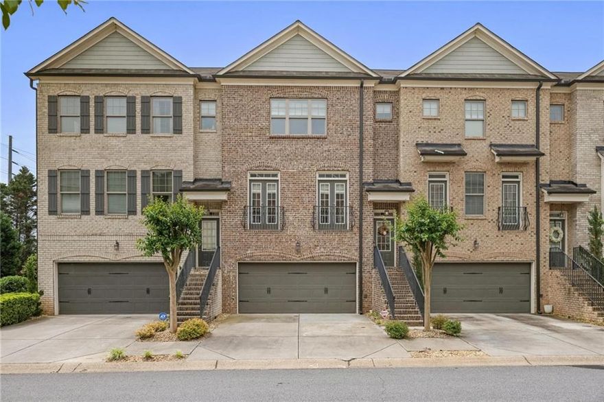Discover luxury and convenience in this upscale, 4-sides brick, 3-level townhome, perfectly situated just 2 miles from I-75 and a mere 4 miles to the charming Historic Marietta Square! This residence offers an abundance of stylish design elements that will captivate your senses. Step inside to an inviting open floor plan highlighted by gleaming hardwood floors throughout and elegant wood stairs adorned with iron balusters. The custom trim and crown molding add a touch of sophistication throughout. The kitchen is a chef's delight, featuring raised panel wood cabinetry with granite countertops and sleek stainless appliances. Relax in the fireside family room or entertain in the formal dining area. Retreat to the stunning vaulted master suite, a true haven, complemented by tile baths and a convenient laundry setup. With two bedrooms upstairs and one on the lower level with garage entry, every bedroom is an ensuite, providing privacy and comfort for all. This home also boasts modern upgrades, including a brand new HVAC system with new furnace and outdoor condenser, as well as a brand new water heater, ensuring year-round comfort and efficiency. Don’t miss the opportunity to call this beautiful property your home, where style meets convenience in a sought-after location!