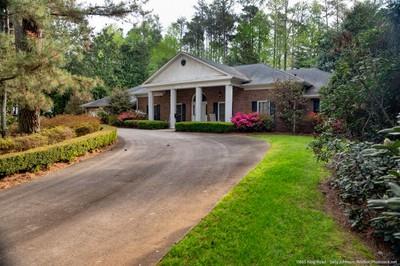 Welcome to a hard-to-find Chatham built ranch in Roswell. Built in 1972 and has had ONE owner that lovingly took care of this house. The circular driveway welcomes you to the 4200+ square foot ranch with two car attached garage. Owner was a meticulous gardener offering seasonal landscaping for your pleasure. With 4 bedrooms, 4 full bathrooms, and 2 half baths, you will enjoy the space and expansion opportunities to meet your family, home, office needs and more. Oversized rooms, oversized backyard with room for a pool. Free standing brick fireplace on patio for your outdoor entertaining. The garage features a spacious workroom with lighting. There is a separate shed on property for other storage needs. Location is amazing! Close to wonderful North Fulton Schools, parks, and the downtown districts of Roswell, Crabapple, and Alpharetta. Welcome to Brookfield Country Club. Membership to the Club is separate from the voluntary HOA. The Club, when you join, includes Golf, Tennis, Pickleball, Swim, Dining, and events. Roswell was just awarded #3 of Top Small Southern Towns. Awards based upon charm, economies, family friendly environment.