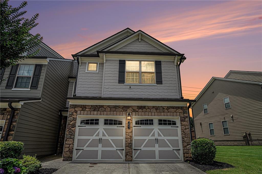 Immaculate End Unit Townhome – Prime Location Near Outlet Shopping, I-575, and Downtown Woodstock!
This like-new, move-in-ready home offers a 2-car garage with stepless entry and a spacious, open-concept layout. Enjoy a stunning kitchen with a large island, granite countertops, and high ceilings that flow into a cozy living area with a fireplace. Upstairs, you'll find oversized bedrooms, generous closets, and beautifully tiled bathrooms. Don’t miss your chance—schedule your private showing today!