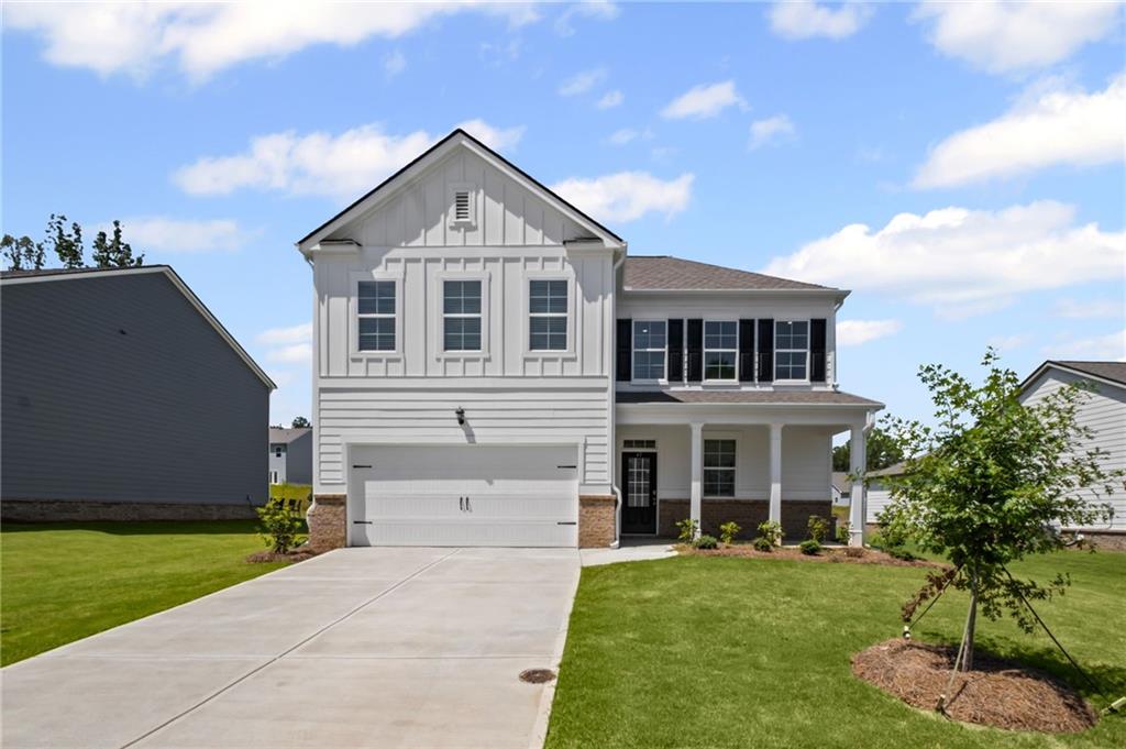 Welcome to 77 Grove Springs Court, a new construction home at Parkside at Carter Grove community in the revered Cartersville, GA!
This Elston plan home has a lot to offer in its 2,174 square feet of 4 bedrooms and 2.5 bathrooms. The gorgeous views create the perfect
home for relaxation. Make your way into the foyer from the front porch or two-car garage entrance, and immediately step into the
charming kitchen. The kitchen boasts grey shaker cabinets. Granite countertops, stainless-steel appliances, and walk-in pantry. From the
chef's island, you can overlook into the expansive great room.
Active families can enjoy the durable Rev Wood laminate flooring for easy maintenance. The second level does not disappoint either. A
loft area greets you as you step off the staircase. Two additional bedrooms are directly to the left of the loft area. A hallway on the other
side of the loft area is where you will find the laundry room, a full bathroom with dual vanity, and the third additional bedroom. The
spacious primary suite completed on the main floor. The primary bedroom features a vast walk-in closet and relaxing private bathroom
including, separate walk-in shower, soaking tub, and dual vanity.
