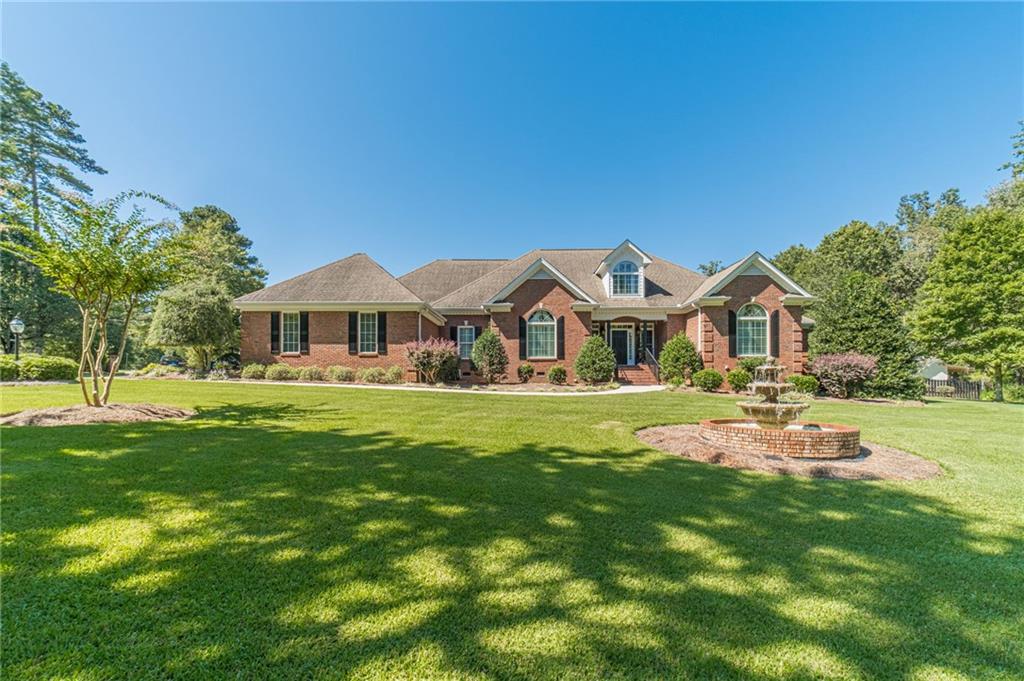 Custom-Built 5-Bedroom Ranch Estate with Pool, Guest Apartment & No HOA
This one-of-a-kind custom-built ranch on a large, level corner lot offers unmatched space, craftsmanship, and amenities—all with no HOA. Designed and built by the builder/owner, this meticulously maintained one-owner home is loaded with luxury details inside and out.
The main residence features 5 bedrooms and 4.5 bathrooms, hardwood floors throughout, and multiple living spaces including a great room with authentic pub-style bar, wood beam ceilings, and sink with built-in refrigerators, a separate family room with fireplace, a library, bonus room, exercise room, and media room.
The oversized master suite includes a tray ceiling, fireplace, custom walk-in closet, and a spa-like tile bathroom with double vanities, soaking tub, and separate shower. The chef’s kitchen boasts custom cabinetry, a large island, stainless appliances, and a keeping room.
Outdoor living is equally impressive with an in-ground saltwater pool and pool house, outdoor kitchen, outdoor fireplace, and professionally landscaped yard with irrigation and a three-tiered fountain.
A detached garage includes a workshop and a full apartment with bedroom, living room, kitchen, and bath—ideal for guests, in-laws, or rental income. Additional highlights include a carriage house, 5-car garage, and parking for up to 20 vehicles with side access.
This estate blends elegance, comfort, and functionality, offering the perfect retreat for entertaining, family living, or multi-generational needs. Homes like this are rare—don’t miss your chance!