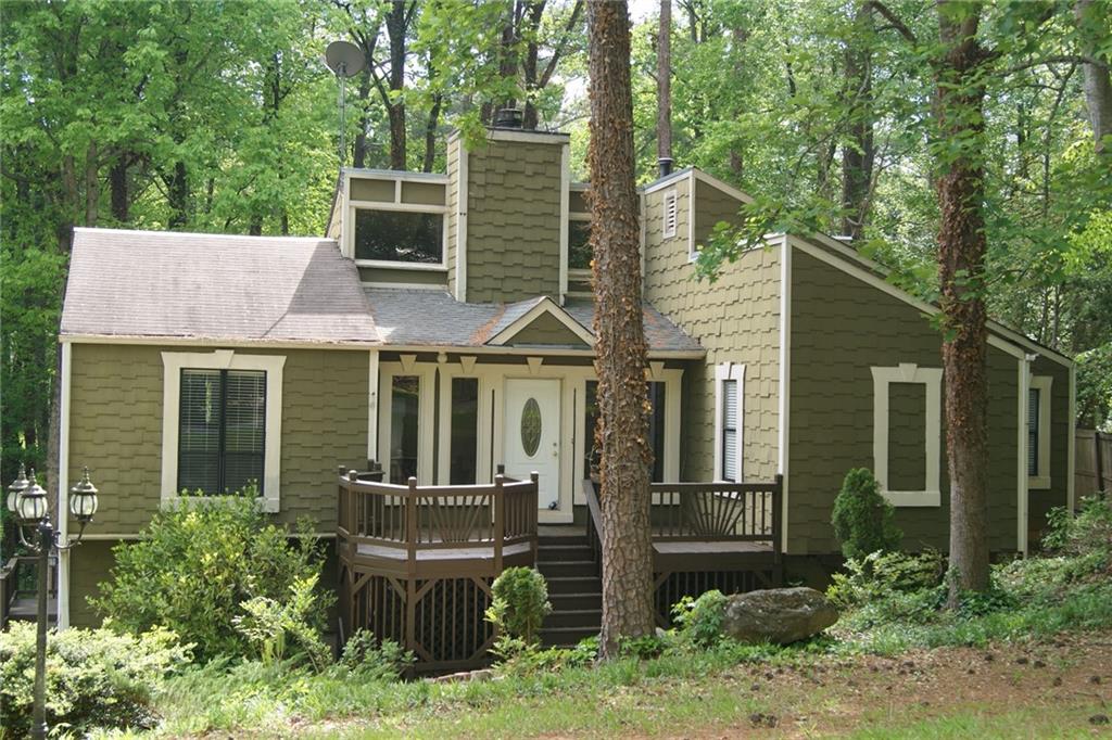 Large clean home with new roof, newer paint in all rooms and multiple decks, newer kitchen, stain cabinets and granite countertop on kitchen, master bath, and hall bath, newer solid hardwood floor on all three main level bedrooms, tile floor on living area and basement. Excellent schools and neighborhood.