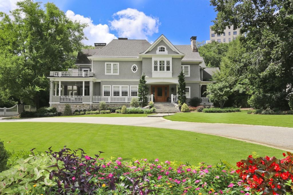Situated on well over an acre,this Ansley Park landmark underwent an extensive renovation/expansion in 2008 under the direction of Linda MacArthur.The home boasts a large wrap around front porch,10+ ceilings, beautiful millwork,incredible spaces and large rooms, open floorplan,6 fireplaces, stunning kitchen opening to family room,master on main and all the amenities for modern living. 2/2 guest house and finished lower level. The impeccably landscaped grounds offer great privacy not often possible in Ansley Park.Incredible opportunity for the most discerning buyers!