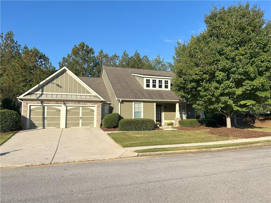 Gorgeous ranch home with open floor plan and located in sought after neighborhood with unparalleled amenities! Home is located on a large corner lot. Home offers beautiful wood floors throughout and lots of natural light with tons of windows. Kitchen has huge island, lots counter and cabinet space, new gas oven and walk in pantry which is perfect for entertaining, hosting holidays or just spending quality family time. Spacious family room has lovely coffered ceilings and gas fireplace. Home also has a large dining room or flex space that can be used for a formal living room, play room, office, etc. The oversized master suite has plenty of space for a sitting or office area and the onsuite has separate shower and garden tub, double vanities and large walk in closet. This desirable home also offers tons of outdoor living space with sunroom, patio and hot tub! Be sure to drive by the resort style amenities...swimming pools that inlcude slide, play area, splash pad and more, expansive playground, recreational area for soccer, baseball, football or other sports, tennis courts, basketball court, sand volleyball and neighborhood garden area just to name a few. Look no further! This is the one!!