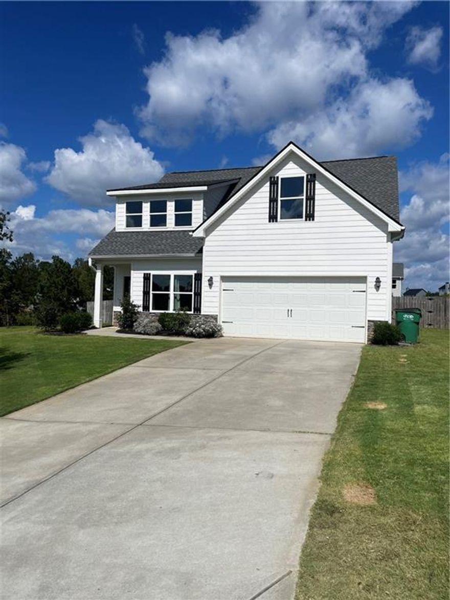 $5,000 PRICE REDUCTION! Ready to sell! Welcome home to this sought after 4 bedroom, 2.5 bath well maintained home in Huntington Manor Subdivision! This 2200+ square foot home is conveniently located near schools, shopping and bypass. Situated in a quiet cul-de-sac, the home is adjacent to the neighborhood greenspace which includes a firepit, benches and swings, soccer field, picnic tables, parking area and open space. Seemless and timeless LVP flooring throughout foyer, dining room, living room and kitchen. Master on main with en suite bathroom, complete with double vanity, deep soaking tub and separate shower. Three additional bedrooms upstairs with an additional loft/seating area, ideal for office, library or play area. Kitchen has beautiful granite countertops, stainless steel appliances and a large walk in pantry. The kitchen is open to living room, making it easy to entertain. Two car garage is located right beside kitchen and pantry. Large back yard has been fenced, perfect for children and pets. Thoughtful landscaping to enjoy year round. Only one in the neighborhood for sale and it's ready to go!