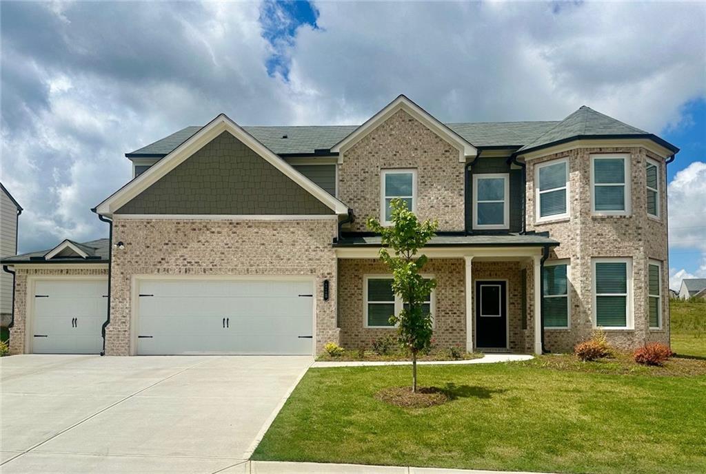 The CARTAY Plan - Lot 100b: 5BR/3BA 3 CAR GARAGE HOME ***HOMES that Close in 30 DAYS get 10,000 ANYWAY, ALONG WITH 10,000 IN CLOSING COST with the use of the preferred lender- Arch Capital (Chris Jenkins). Beckett Ranch is a Brand New Community Situated in the Lively and Timeless "SOUTHERN CHARM" Town of Auburn, GA. Beautiful Open Concept Spacious Plan has Room for Entertaining. The Great Room and Kitchen area Enjoy a Lovely View of the Back Yard. Enter into a Formal Dining Room and Living Room/Office/Playroom. On the Main Level you will also find a Bedroom and Full Bath that will Delight Extended Family or Guests. A Few Highlights Include: Luxury Vinyl Planking Throughout the Main Level Living Areas, a Kitchen with GRANITE COUNTERS, TILE Backsplash, and a STAINLESS -STEEL Appliance Package. Upstairs You May Like to Have a Movie Night or Watch a Ball Game in the Media Room and How About the Convenience of an UPSTAIRS LAUNDRY ROOM! Enter into a Large Main Suite with a Beautiful Spa Bath, Including a DOUBLE VANITY with a Granite Counter Top, Separate Tile SHOWER and TUB, LARGE WALK IN CLOSET. This MAGNIFICENT Home is (Total Electric) ENERGY EFFICIENT. Some STOCK PHOTOS.
The Property Also Includes a Fully Landscaped and Sodded Yard on All Four Sides and COVERED BACK DECK.