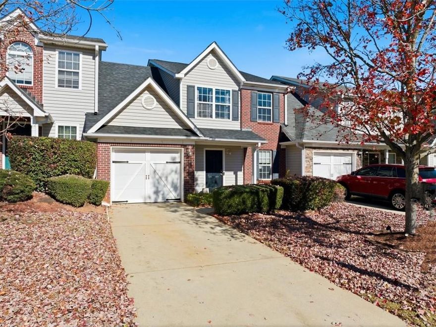 Hello Hello!! Welcome to 720 City Park Drive right here in Town Village community. This beautiful 3Bedroom, 2.5Bath brick front townhouse is nestled into the heart of McDonough. It's 1,860 square feet of living space is everything of comfort, with a living room that provides a great entertaining space. The charcoal accent wall and soft lighting gives off a cozy and welcoming atmosphere. The dining space is bright with sparkling pendant lights and french doors that leads right out to a fenced in backyard of peace. The backyard offers a place of play, gardening or grilling and more! This townhome also comes with a brand new roof, giving added value and peace of mind. HOA -covers the grounds, making it easy living, with a modest HOA and quiet community feel. This property would be ideal for a first-time buyer or investor seeking a move-in-ready opportunity. This town home is located just minutes from downtown McDonough, local schools, dining and shops. TALK ABOUT LOCATION!! Now schedule your time to come out to see this beauty! Thank you for showing.