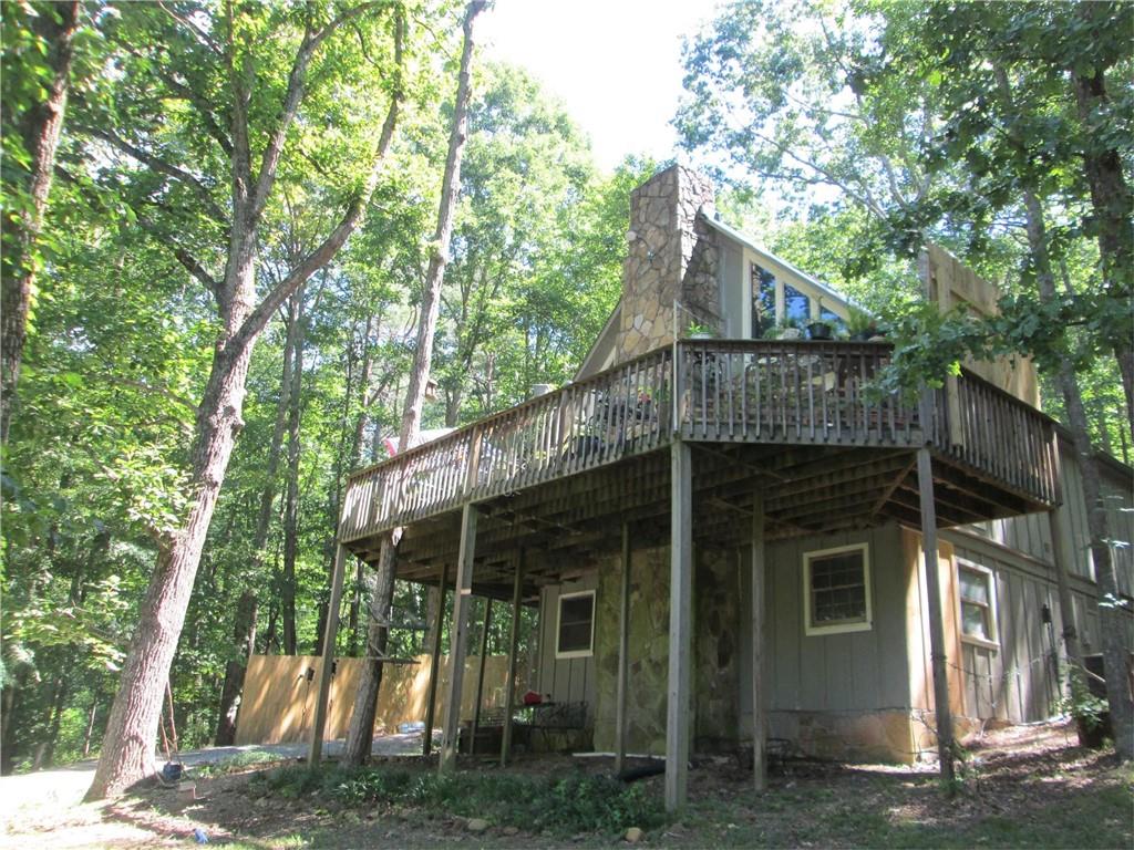 Lake side get away, 2 bedroom 1 bath, large living room, eat in kitchen, granite counter tops, hardwood floors, tongue and groove ceilings and walls, central HVAC, Generac generator, Large Deck, Security System, All appliances remain as well as washer an dryer, tons of natural landscaping, Also there is an additional cabin for sale at 480 Sun Mountain Road, on a separate MLS, Separate Plats but join each other. Scenic views, and down the path to the lake. More photos to come soon.