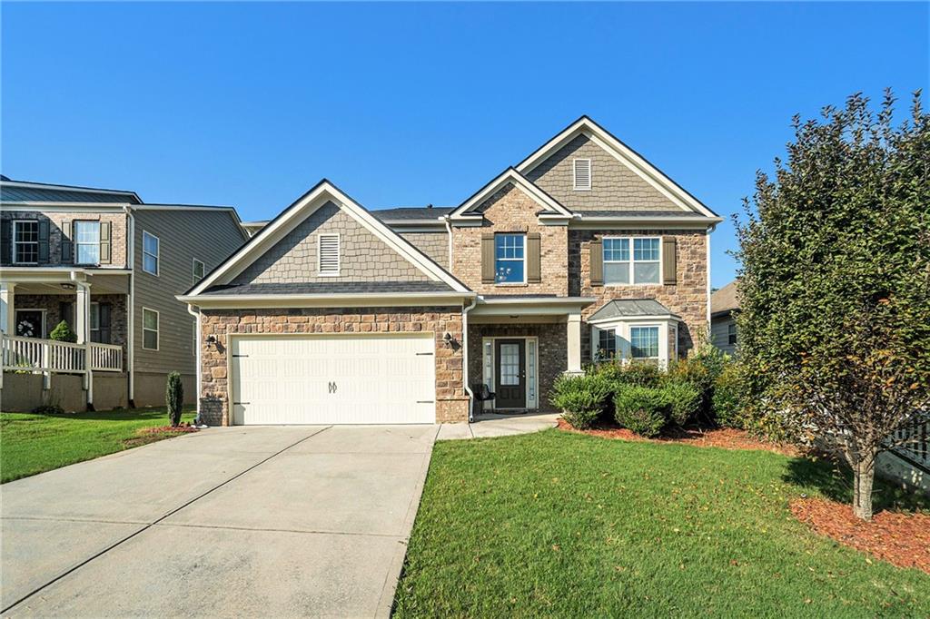 Discover this stunning two-story home in the sought-after Centennial Lakes community of Acworth, offering an exceptional combination of comfort, style, and neighborhood amenities. The inviting main floor features a bright and open layout with a spacious living room, dining area, and well-equipped kitchen designed for both daily life and entertaining. A desirable bedroom on the main level provides the perfect space for guests, a home office, or multigenerational living.
Upstairs, the private primary suite is a true retreat, highlighted by a beautifully renovated spa-inspired shower in the primary bathroom. Additional secondary bedrooms offer generous space and storage for the whole family. Outside, enjoy a backyard ready for relaxation or play, along with access to Centennial Lakes’ incredible amenities including swimming pools, tennis courts, playgrounds, and walking trails. All of this, just minutes from shopping, dining, top-rated schools, and easy commuter routes.