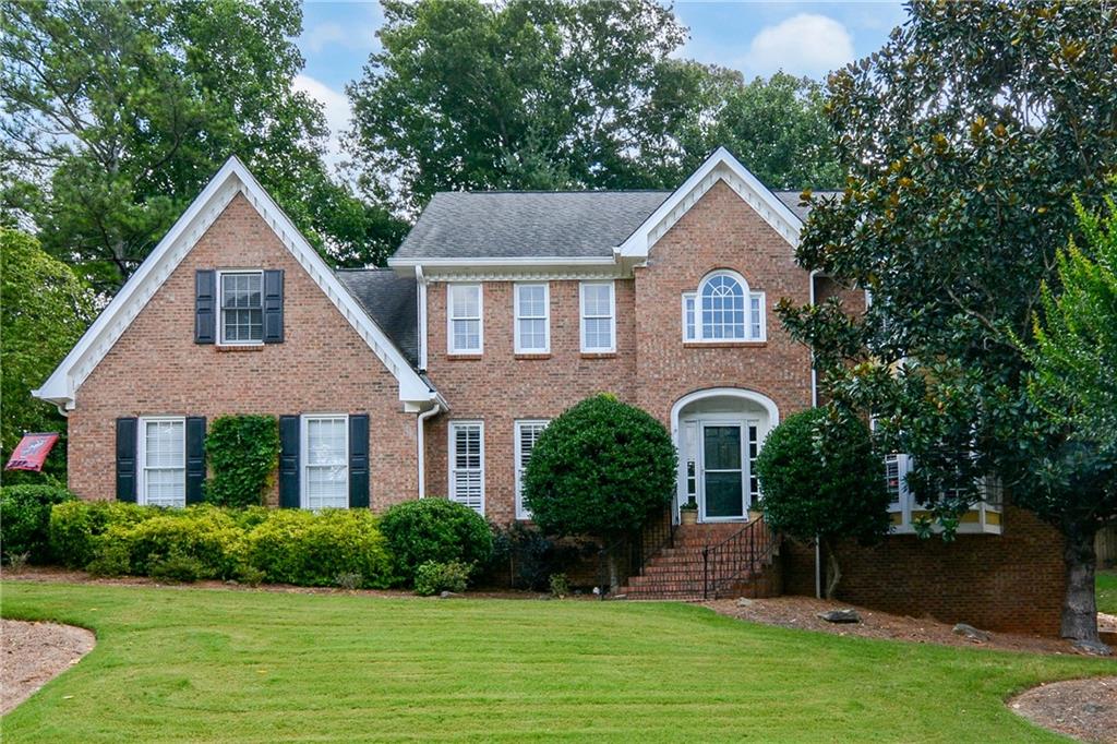 Don't miss this GEM in the heart of Peachtree Corners, the neighborhood is a well established with fantastic amenities and a park with access to the Chattahoochee River. Guys, this is TRULYa chef's kitchen with all custom cabinets (and I mean a LOT of cabinets), beautiful granite, newer appliances, beautiful hardwoods, TONS of light and the counter space is more than most kitchens could dream of! Upstairs the primary suite has a renovated bath with a separate dressing area (ladies, it's your own space to get ready and you'll never have to share a sink or counter space again)! The closet will be the envy of all your friends, it's almost as big as a bedroom and has....drum roll.....custom closets, just like the kitchen. TONS of space for every stitch of clothing you own, heck, you may need to go buy more clothes to fill this guy up! We have 3 additional bedrooms upstairs and two of them share a jack and jill bathroom, it'll be no surprise that the closets in those rooms also have custom closets so there will be no excuse for kids to pretend the floor is their largest shelf. The basement deserves it's own paragraph, the options are endless and while we technically don't have a true bedroom down there, you could totally make one as you'l love the updated full bathroom. Should you not desire your teenagers to become cellar dwellers, you could use the expansive room as a movie theatre, a gym, an office or the world's largest playroom. We currently have a pool. table in the main room, this may stay or go depending on the lucky (some may say smart) recipient who buys this house. if you love to entertain, you'll be thankful that you have a great wet bar down there that is darn close to being a second kitchen. The backyard is level and wide, the screened porch is fantastic for quiet mornings and nice evenings and unlike so many houses, we have not only a big driveway for more cars than you'll want guests but it's been redone and believe me folks, concrete is expensive. Don't wait on this one, someone will swoop her up if you don't!