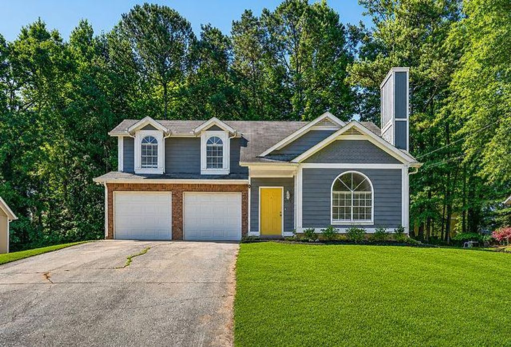 Photo of 5515 Forest Downs Circle Circle, Atlanta, GA 30349 (MLS # 7786107)