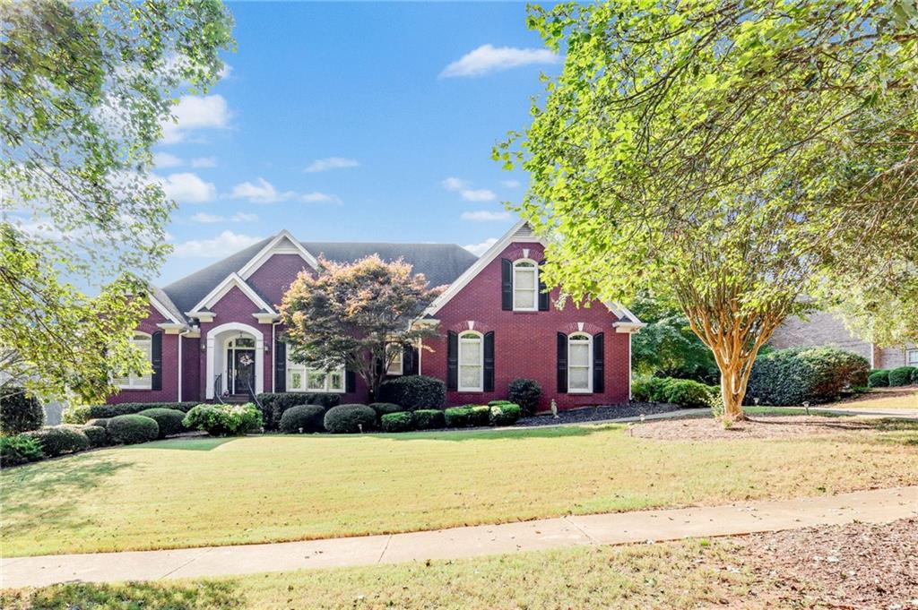 Welcome Home! Beautiful and spacious 4 bed 3.5 bath located in Monroe! This traditional-style home offers plenty of room! Inside, you'll find a separate dining room, an eat-in kitchen, a cozy living room with a fireplace, and laundry room. The primary suite is oversized and features a walk-in closet - the primary ensuite bathroom features double vanities, large shower, and a separate soaking tub. Finished basement adds tons of living space, perfect for home office, gym, movie room - or whatever you want it to be! The outside living area includes a screened in porch, and a covered patio off the basement that opens up to a large backyard. The community has a pool and tennis courts! Schedule your showing today!