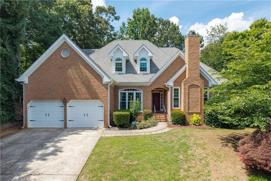 Hard to find Primary bedroom and office on main level! This beautifully updated home features hardwood floors throughout the entire main level and has been freshly painted inside and out. The elegant dining room flows seamlessly into the spacious living room, while the fireside family room opens to a gourmet kitchen complete with stainless steel appliances, granite countertops, and a sunny breakfast area.  The oversized main-level primary suite offers abundant natural light, and a luxury renovated bathroom boasting new cabinetry, double sinks, granite counters, a soaking tub, and a large separate shower.  Upstairs, you’ll find three generously sized guest bedrooms and two fully renovated bathrooms, perfect for family or visitors.  The spacious back deck has access from the kitchen and the living room, and it overlooks a flat fenced backyard.
