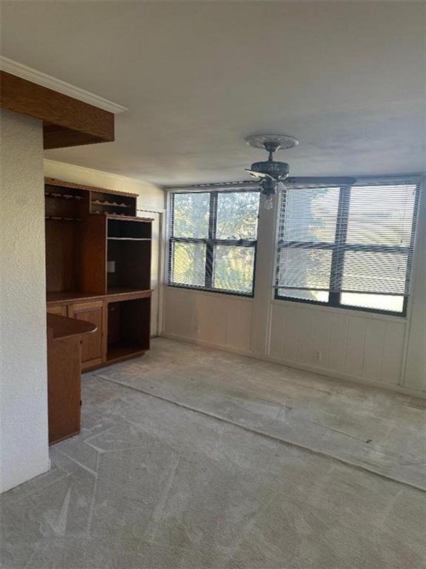 Location Location Location!  In town country club living in heart of Buckhead in fabulous Cross Creek Condominiums! This unit is first floor !   Walk out to 4 tennis /pickle ball courts, 18 hole par 3  golf course, 3 pools, (2 satelite pools have clubhouses too!) main  clubhouse has  restaurant, bar, fitness center and Pro shop!, meeting rooms and onsite Management Office!  Community has EV Charging stations !! Close by walking trails, shopping, restaurants, schools, I-85, Buckhead, Lenox Mall, West End, Atlantic Station, Ga. Tech ! ***** Selling AS-IS **** Fix and flip or live in this large, 3 bedroom , 2 bath 1 level unit, wood burning fireplace , built-in  bookcases, formal living room , formal dining room, eat-in kitchen, large sunroom with lots of windows, good size bedrooms , 2 full baths!