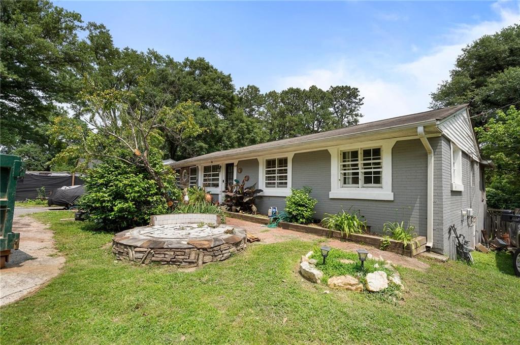 Awesome Investment opportunity off Popular Bells Ferry rd in East Cobb. Conveniently located close to shopping and highways. Plenty of options here! Almost half an acre lot! 4 bedrooms and 1.5 baths. This home is just calling for someone to come make it a HOME.