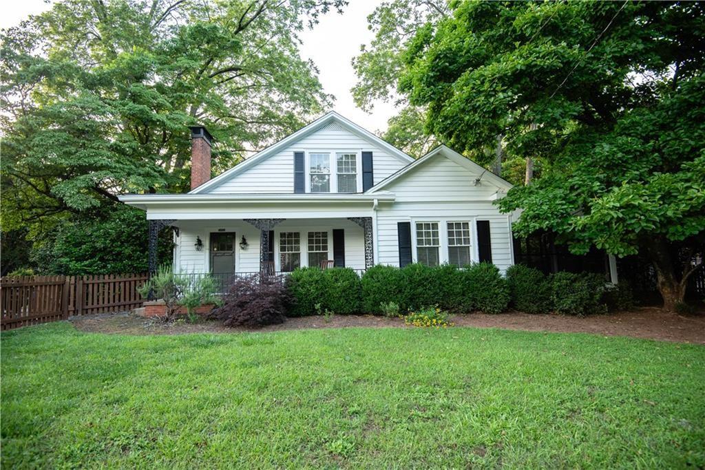 Welcome to the heart of downtown Stone Mountain. This historic home sits nestled between Stone Mountain Park entrance and the vibrant
Main Street. The home features four bedrooms, two full bathrooms, multiple living spaces plus a large screened-in porch. The kitchen has been updated with all new appliances, tile flooring and quartz countertops. The HVAC system was replaced in 2025. The large
grassy lawn in front and back is the perfect place to relax. There is plenty of parking in the back along with an oversized detached garage
perfect for your cars or workshop. The beautiful original hardwood floors, high ceilings, gas fireplace, and glass doorknobs are just a few of
the incredible details. This home was built by the great-grandparents of the current owner! If you appreciate
historic homes and proximity to nature trails, restaurants, coffee shops, and retail, all while being minutes to Atlanta, this is the perfect
home for you. Lawn maintenance is included and pets are negotiable.