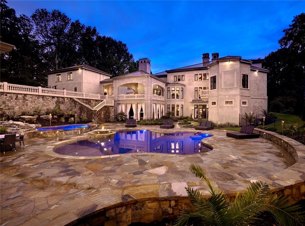 Designed from the ground up this home embodies character, strength and integrity. Every aspect designed and brought to life by NFL MVP, Hines Ward! The heart and soul of a legend lie within the walls of this amazing home. The landscape design was orchestrated to provide privacy but not distract from the art deco styling of the home. Slip into total tranquility with the sounds of cascading waterfalls. An entertainment paradise in the ultimate man cave, expansive salt water pool, separate hot tub, outdoor kitchen, bar, candle lit grotto, cabana and basketball court!