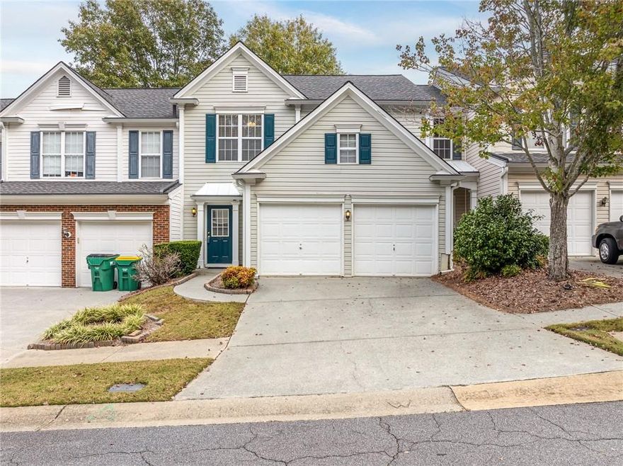 Discover this exceptional fee simple townhome inside the Regency at Weatherstone community in Woodstock, where modern living meets comfort. The open main level features light hardwood floors, leading to a spacious fireside family room, a dining area with a fun light fixture, and a convenient powder room. The kitchen offers laminate countertops, white appliances including a gas range, tile flooring, and a breakfast bar—perfect for easy entertaining. Upstairs, you’ll find all three bedrooms, including a primary suite with vaulted ceilings, a large walk-in closet, and an ensuite bath featuring a double vanity, separate tub, and shower. The secondary bedrooms are nicely sized, and the laundry room is conveniently located near all bedrooms, eliminating the need to carry baskets up and down the stairs. Step outside to a spacious patio and open backyard with no fence, offering plenty of possibilities for outdoor enjoyment. Located in a quiet subdivision, this home benefits from a low-fee HOA that covers the roof, siding, and trash collection, while providing access to Weatherstone amenities. With easy access to I-575 and GA-400, and just minutes from Downtown Woodstock, Roswell, and Alpharetta, you’ll enjoy a low-maintenance lifestyle and the advantage of Cherokee County taxes.