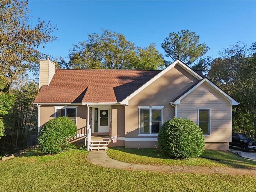 Listed by Mano Sells Homes: Discover this beautifully maintained 3-bedroom, 2-bath home offering the perfect blend of comfort, style, and location. The main living area features vaulted ceilings, a bright open layout, and fresh interior paint complemented by updated light fixtures. The kitchen is equipped with a new disposal and 2023 stove, opening directly to a spacious deck—ideal for morning coffee or evening gatherings. The laundry room is conveniently located on the main floor, and the ensuite master bedroom boasts dual (“his and hers”) closets for generous storage.

The basement, complete with new carpet, provides additional living or recreation space and can easily be converted into a fourth bedroom or private suite. It offers direct garage access and an adjoining workshop for added functionality. The roof was replaced in 2020, offering peace of mind for years to come

Enjoy the convenience of being within walking distance to downtown Carrollton, local restaurants, the Carrollton Center for the Arts, the GreenBelt and the nearby University of West Georgia. With no HOA restrictions, you’ll appreciate the freedom to make this home truly your own.

Schedule your private showing today and experience refined living just steps from everything Carrollton has to offer!