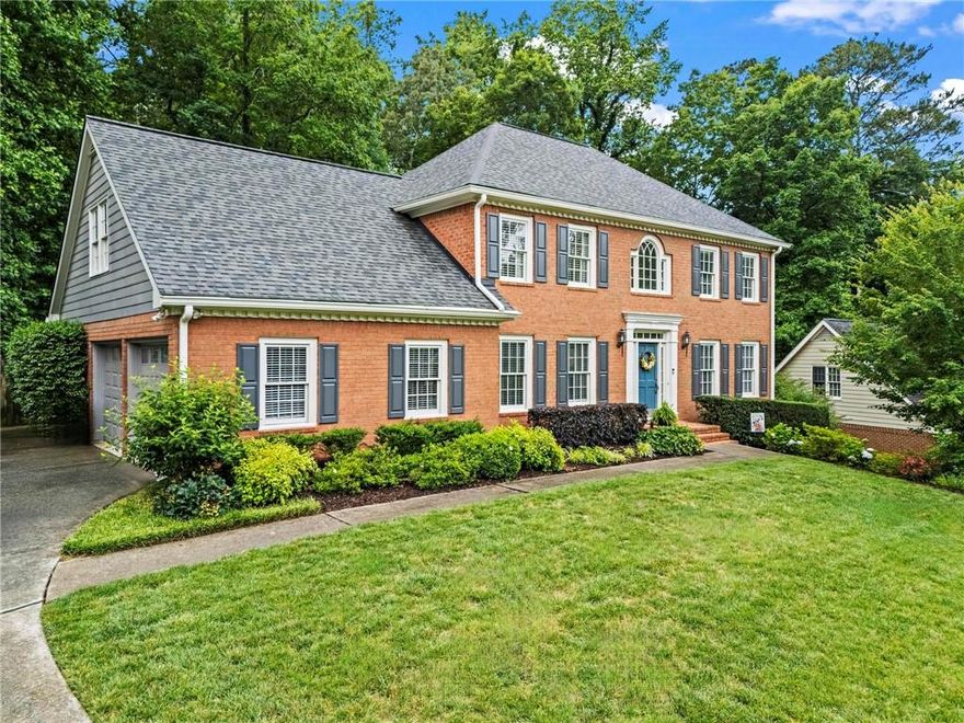 Simply remarkable two-story brick traditional in coveted Chadds Walk community! You will be hard pressed to find a more updated, well-loved home of this caliber below $800k in all of East Cobb. We all agree that Seller should be an interior designer considering the flawlessly executed paint colors, gorgeous light fixtures, and meticulous updates throughout. Out front, lush landscaping and timeless curb appeal greet all who visit. Inside, the two-story foyer is flanked by both a formal sitting room (an ideal office space) and formal dining room with space for a large table. At home chef’s and UberEats connoisseurs alike will all agree that this kitchen is indeed the hub of this sweet home with its upgraded cabinetry, stone countertops, stainless steel appliances and dreamy walk-in pantry. Charming vaulted breakfast room is currently being used as a sitting area and makes the perfect spot for morning coffee. The fireside gathering room is large and in charge with access to the backyard and a fun wet bar tucked around the corner. A powder room and large laundry room (with direct exterior access) complete this main level. Upstairs, the primary suite is a serene oasis with its soaring ceilings, dramatic chandelier, and lovely walk-in closet outfitted with custom cabinetry! A lavish retreat, the en-suite bathroom features dual vanities, a large soaking tub, and separate shower. Hardwood floors were added to the landing and connect the remaining three bedrooms, all with generous closet space and double window natural light. Upstairs guest bathroom also offers a dual vanity setup and separate room for the tub/shower combo. Endless possibilities exist in the finished basement! Perhaps a recreation room with pool table, a private office, or another living space? No matter which you choose, the large windows, lovely built-ins and exterior entry are amazing perks of this space. Remaining half of the basement is unfinished and ready for your future expansion needs! The fun continues outside where the backyard doubles as an enchanted garden. Large deck overlooks the mature trees, happy hydrangeas, and meandering paths. There is a large flat area near the privacy fence if a playground or trampoline is desired. Perched beautifully above an ever-desirable cul-de-sac, this location within the neighborhood is unmatched and offers close proximity to the HOA amenities including swim, tennis, and clubhouse (currently being updated). This social community is located within a top-rated school district and mere minutes to premier shopping and dining destinations around East Cobb and downtown Roswell. Welcome home to 4792 Fairville Court, where life is good and living is easy!