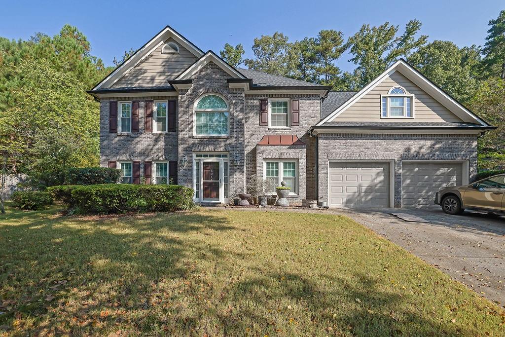Welcome to this beautifully updated home in the highly sought-after Fords Lake community. Featuring 4 spacious bedrooms and 2.5 bathrooms, this residence blends modern upgrades with timeless appeal.
The open-concept design seamlessly connects the living, dining, den, and kitchen areas—ideal for entertaining or everyday living. The kitchen boasts granite countertops, stainless steel appliances, a walk-in pantry, abundant counter space, a breakfast room, and plenty of natural light. Hardwood floors flow throughout the main level, adding warmth and elegance.
Recent updates include a new roof and gutters plus lifetime-warranty windows, providing low-maintenance living and lasting peace of mind.
Step outside to a fenced backyard with professional landscaping and accent lighting, perfect for gatherings or quiet evenings. The home sits in a swim and tennis community on a stocked lake, offering a true lifestyle experience.
Located just minutes from shopping, dining, and quick access to I-75, this property combines convenience, charm, and quality in one perfect package.