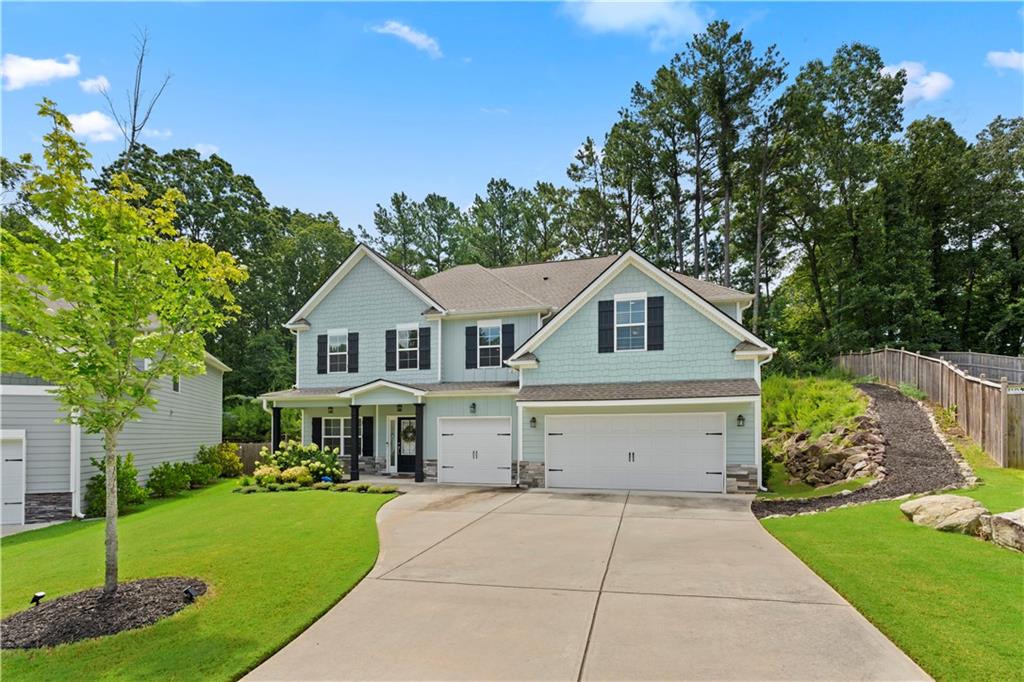 Nestled in the heart of Mableton, 540 Glen Abbey Circle is the dream home you didn't know you needed! With a generous 3,451 square feet of living space sitting on a lush .50+ acre lot, this 6-bedroom, 4-bathroom gem is more than just a house—it's your future home!
Step inside to be greeted by spacious rooms that balance comfort and style. This open floor plan is perfect for entertaining. Got a penchant for culinary creations? The gorgeous kitchen offers all modern conveniences with upscale finishes. There's a huge walk-in pantry for extra storage and the formal dining room is just steps away to make Sunday dinners the place to be! There's also a guest room with ensuite on the main level.
The oversized owners suite is a haven - with a cozy sitting area, spa-like ensuite and huge walk in closet. There are 4 additional bedrooms and 2 baths on the 2nd floor and a convenient laundry room.
The private backyard and lovely covered patio with outdoor fireplace is a great place to entertain guests or sneak away for some solitude and your morning coffee.
So why wait? Experience life at 540 Glen Abbey Circle today!