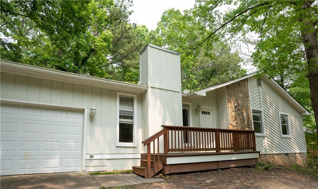 Welcome home to comfort and charm! This delightful 3-bedroom, 2-bathroom residence offers an inviting open living room and family room, perfect for gatherings around the cozy wood-burning fireplace. The kitchen boasts a bay window and a large eating area, making it ideal for everyday meals and entertaining. Step outside to a huge back deck overlooking a private yard – your personal oasis for outdoor fun or quiet relaxation.
Nestled in a highly sought-after area, you'll enjoy unparalleled convenience with easy access to US 78, GA 124, and Atlanta, placing you moments from top-tier shopping, diverse dining, entertainment, and recreation. This is the perfect home for first-time homeowners or savvy investors looking for a prime opportunity!