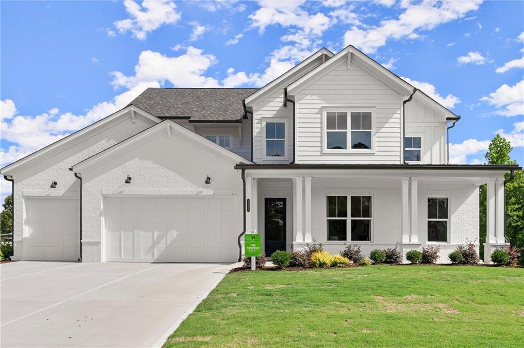 Welcome to Hillgrove Preserve, a thoughtfully designed new home community located near the border of Powder Springs and Marietta, brought to you by family-owned and operated Brock Built Homes—celebrating over 40 years of building quality homes across Atlanta. This beautifully crafted Trenton plan offers a blend of refined finishes and functional living. The main level features soaring 10-foot ceilings, a versatile flex room, a laundry area, and a bright sunroom ideal for relaxation or entertaining. The open-concept kitchen is a showstopper with a large quartz island, upgraded cabinetry to the ceiling, wall oven and microwave, gas cooktop with a vented hood, pots and pans drawers, trash pullout, under-cabinet lighting, and a designer backsplash. The adjoining family room features a 42” direct vent fireplace, creating a warm and inviting atmosphere. The main-level suite includes a luxury bath with a tub, quartz countertops, and a zero-entry shower. Upstairs are four spacious bedrooms, each with walk-in closets, three full bathrooms with tile flooring and tile surround, and a large media loft. Additional highlights include luxury vinyl plank flooring throughout the main living areas, white oak stair treads with metal balusters, a covered rear porch, front porch, and a three-car garage. Hillgrove Preserve offers a peaceful setting close to shopping, dining, and major thoroughfares, all within the sought-after Hillgrove High School district. Outdoor enthusiasts will love the area’s access to community pools, golf courses, tennis and pickleball courts, scenic hiking trails, horseback riding, and even BMX parks—creating endless opportunities to stay active and enjoy the outdoors. This home is move-in ready—call or visit today for a complete list of included features. Stock photos used. Agent is at Off-site location, please contact for appointment.