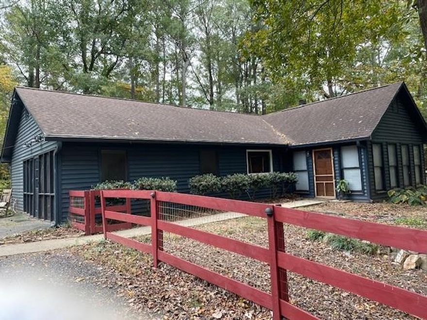 This beautifully updated home is nestled in a serene, private setting and also right in the heart of an area with award winning schools, a national park, diverse dining options and a thriving business environment.  This two bedroom two bath home features a newly renovated kitchen, updated bathrooms, and a bonus utility/laundry room with ample storage solutions. Durable LVP was laid throughout main areas and new tile in the bathrooms. The unique and advantageous features of this listing are the 1+ acre wooded lot, offering a safe area for children to explore, an outside firepit adorned with extra seating and twinkle lights that create a cozy and inviting space.  Also, there is a naturally lit sunroom perfect for an office or sitting room. And lastly, the screened in patio porch right off the kitchen.  This patio extends your gathering and entertaining space in the fall and spring when you can sit outside, enjoy the fresh air and just relax! 

Additional amenities include central heating and hair, in-unit washer/dryer, separate laundry/utility room and a low-maintenance yard.  Conveniently located near Hayes Elementary, Pine Mountain Middle, Kennesaw Mountain High School, Kennesaw State University and the Marietta Country Club for golf enthusiasts. 

No smoking, no pets no Section 9.  Utilities are not included.  Application ($39.99), credit and background check required for everyone over 18 yrs old that will reside in the house.