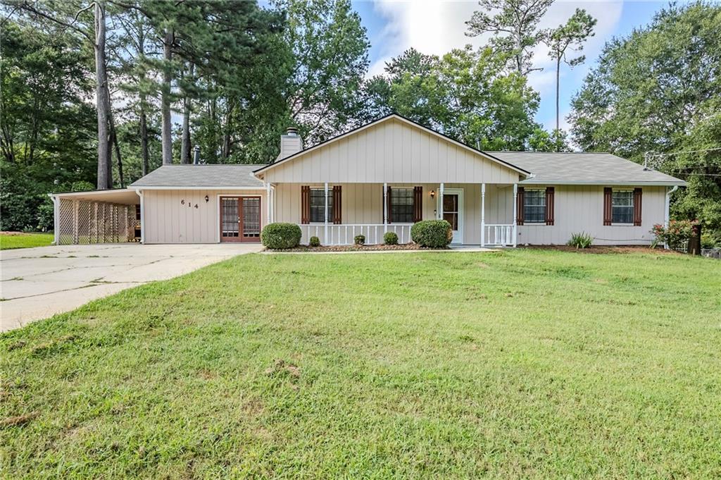Welcome home to this charming 3-bedroom, 2-bathroom ranch nestled in a quiet Fairburn neighborhood. Enjoy relaxing
mornings on the covered front porch, welcoming you into a bright and inviting interior.
Step inside to find a spacious family room with a cozy fireplace, perfect for gatherings and relaxing evenings. The
renovated kitchen is a true highlight, featuring a beautiful tiled backsplash, new quartz countertops, new sink and faucet,
and stainless steel appliances, providing both functionality and style for daily living and entertaining.
A bonus room with a gas-burning stove offers versatile space for a second living area, office, or playroom. The primary
bedroom features a walk-in closet and private bath, creating a comfortable retreat at the end of the day. Two additional
bedrooms are perfect for family or guests and share a fully renovated bathroom.
Recent updates include fresh interior paint, new carpet, and renovated bathrooms, ensuring this home is move-in ready
with modern touches throughout.
Enjoy the outdoors on the large patio overlooking the spacious backyard, complete with a storage shed painted to match
the home, offering additional storage and curb appeal.
Conveniently located near schools, parks, shopping, and dining, this home combines comfortable living with everyday
convenience. Schedule your showing today and make this updated Fairburn ranch your new home!