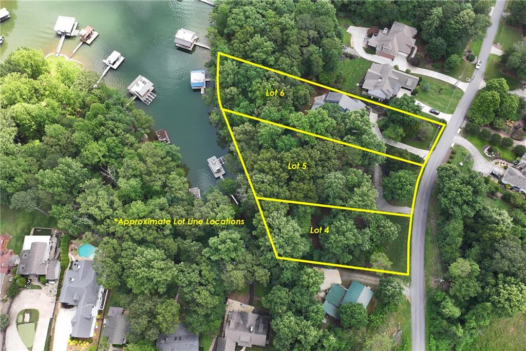 Build your lakeside retreat on this Lake Lanier waterfront lot! This .244-acre property offers direct access to the water and is perfect for those who love to get out on the lake—bring your paddle boards, kayaks, and canoes to enjoy the peaceful cove setting. While there is no dock permit, the lot provides an affordable way to own a piece of lakefront property. An adjoining .26-acre lot is also available, offering the opportunity to expand your space or create a multi-lot retreat. Don’t miss your chance to own lakefront property on Lake Lanier!